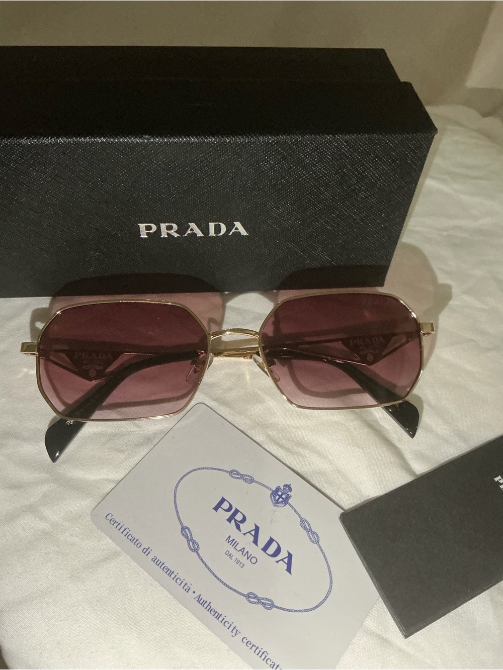 Prada Gold Frame Sunglasses with Pink Lenses